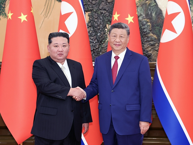 습근평, 조선로동당 총비서이며 국무위원장인 김정은과 회담